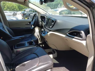 2023 Chrysler Pacifica Touring L with VIN 2C4RC1BG2PR534194, listed as a IAAI auction lot 42613934 with 69,896 mi miles and . Bid and sale history available at DreamBid. Image 5.
