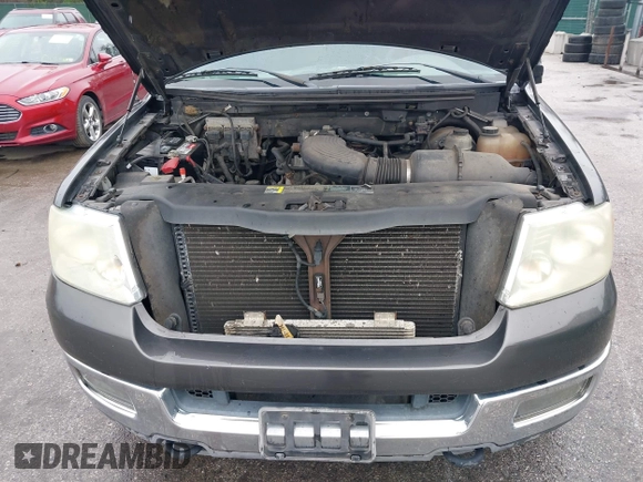 2004 Ford F-150 STX with VIN 1FTRX14W44NA05055, listed as a IAAI auction lot 41960979 with 184,479 mi miles and . Bid and sale history available at DreamBid. Image 10.