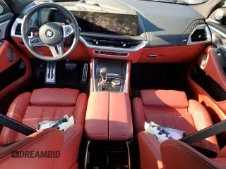 2024 BMW XM z VIN 5YM23CS00R9V38387, wystawiony jako Copart lot #86828434 z przebiegiem Nie podano mil oraz Szkody całkowita. Historia ofert i sprzedaży dostępna na DreamBid. Obrazek 8.