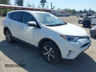 2018 Toyota RAV4 XLE with VIN JTMWFREV3JD130995, listed as a IAAI auction lot 42183630 with 56,624 mi miles. Bid and sale history available at carsss.com. Image 1.