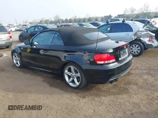 2010 BMW 1 Series 135i with VIN WBAUN9C54AVK41785, listed as a IAAI auction lot 41228825 with 60,817 mi miles and . Bid and sale history available at carsss.com. Image 3.