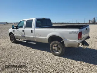 2002 Ford F-350 XL with VIN 1FTSW31S02EB34277, listed as a Copart auction lot 42691765 with 151,026 mi miles and Salvage title. Bid and sale history available at DreamBid. Image 2.