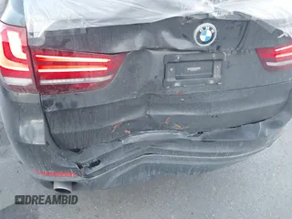 2015 BMW X5 xDrive35i with VIN 5UXKR0C59F0K59728, listed as a IAAI auction lot 41701083 with 83,267 mi miles. Bid and sale history available at carsss.com. Image 6.