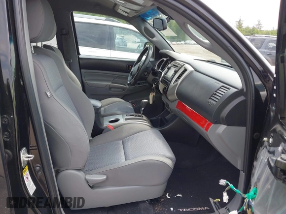 2013 Toyota Tacoma with VIN 3TMLU4EN4DM117239, listed as a IAAI auction lot 42494359 with 239,635 mi miles and . Bid and sale history available at DreamBid. Image 5.