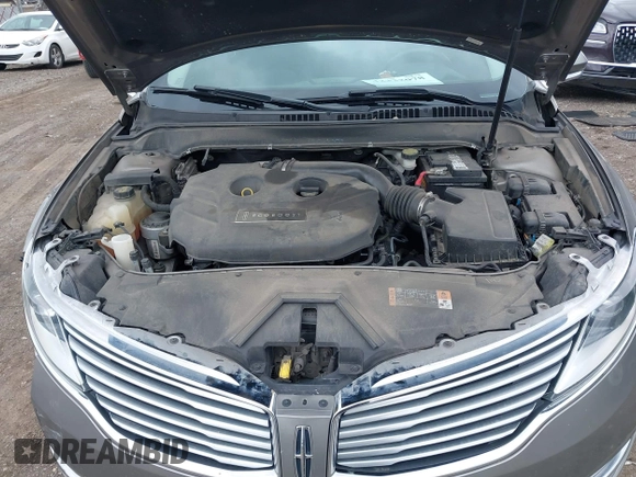 2015 Lincoln MKZ z VIN 3LN6L2J99FR604385, wystawiony jako IAAI lot #42332078 z przebiegiem 116 862 mil mil oraz . Historia ofert i sprzedaży dostępna na DreamBid. Obrazek 10.