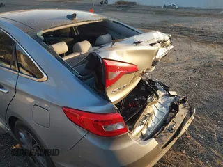 2015 Hyundai Sonata 2.4L Sport with VIN 5NPE34AF4FH019959, listed as a IAAI auction lot 41020000 with 129,535 mi miles. Bid and sale history available at carsss.com. Image 6.