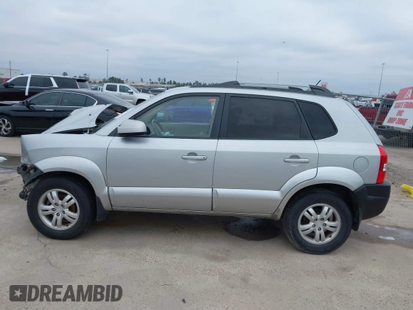 2007 Hyundai Tucson SE with VIN KM8JN12D57U670203, listed as a IAAI auction lot 41619422 with 92,450 mi miles. Bid and sale history available at carsss.com. Image 15.