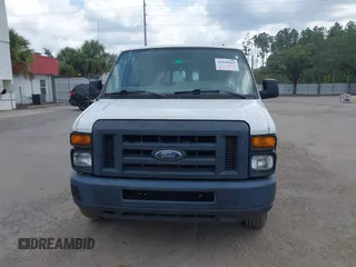 2013 Ford Econoline Cargo Commercial with VIN 1FTSE3EL7DDA87733, listed as a IAAI auction lot 42539015 with 242,027 mi miles and . Bid and sale history available at DreamBid. Image 12.