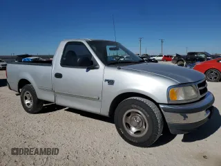 1998 Ford F-150 z VIN 1FTZF1762WKA87421, wystawiony jako Copart lot #86973334 z przebiegiem 217 978 mil mil oraz Szkoda całkowita • Salvage title. Historia ofert i sprzedaży dostępna na DreamBid. Obrazek 4.