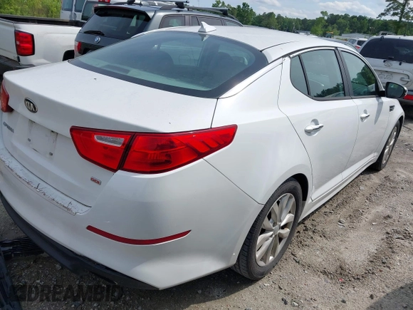 2015 Kia Optima LX z VIN 5XXGM4A76FG399865, wystawiony jako IAAI lot #42312813 z przebiegiem 207 747 mil mil oraz . Historia ofert i sprzedaży dostępna na DreamBid. Obrazek 4.