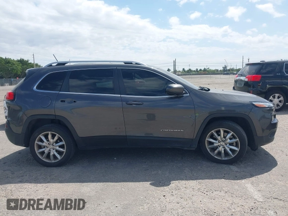 2014 Jeep Cherokee Limited with VIN 1C4PJLDBXEW183095, listed as a IAAI auction lot 41814496 with 89,589 mi miles and . Bid and sale history available at DreamBid. Image 13.