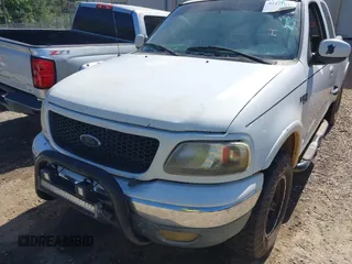 2002 Ford F-150 XL with VIN 1FTRX08L12KB49882, listed as a IAAI auction lot 42121639 with Not provided miles and . Bid and sale history available at DreamBid. Image 6.