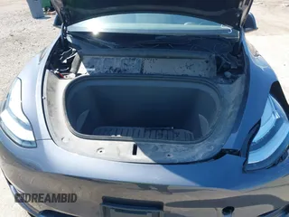 2022 Tesla Model Y Long Range with VIN 7SAYGDEE3NA007737, listed as a IAAI auction lot 42128359 with 42,597 mi miles and . Bid and sale history available at carsss.com. Image 10.