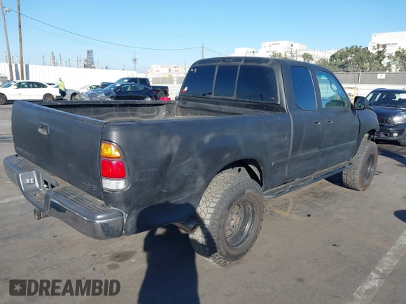 2000 Toyota Tundra SR5 with VIN 5TBRT3419YS114034, listed as a IAAI auction lot 41284071 with 200,797 mi miles and . Bid and sale history available at DreamBid. Image 4.