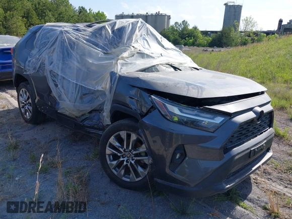 2022 Toyota RAV4 XLE Premium with VIN 2T3C1RFV5NC195230, listed as a IAAI auction lot 40495536 with 30,824 mi miles and . Bid and sale history available at DreamBid. Image 1.