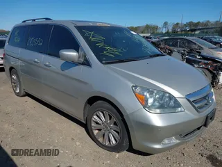 2007 Honda Odyssey Touring z VIN 5FNRL388X7B025462, wystawiony jako IAAI lot #42064852 z przebiegiem Nie podano mil oraz . Historia ofert i sprzedaży dostępna na DreamBid. Obrazek 1.