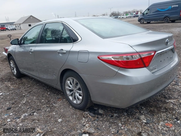 2015 Toyota Camry Hybrid LE with VIN 4T1BD1FK9FU161942, listed as a IAAI auction lot 41880622 with 216,632 mi miles. Bid and sale history available at carsss.com. Image 3.