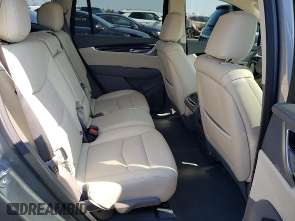 2024 Cadillac XT6 FWD Premium Luxury with VIN 1GYKPCRS7RZ736818, listed as a Copart auction lot 67768804 with 7,145 mi miles and Salvage Title. Bid and sale history available at carsss.com. Image 10.