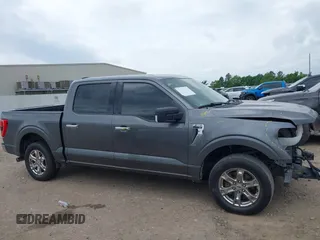 2021 Ford F-150 XL with VIN 1FTEW1CP1MKD21526, listed as a IAAI auction lot 42104907 with 76,317 mi miles and . Bid and sale history available at DreamBid. Image 14.