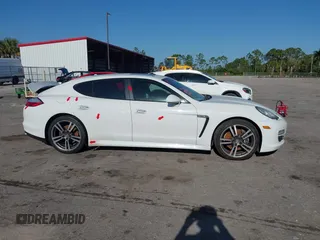 2013 Porsche Panamera with VIN WP0AA2A7XDL014047, listed as a IAAI auction lot 42010031 with 118,681 mi miles and . Bid and sale history available at DreamBid. Image 13.