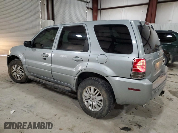 2005 Mercury Mariner Luxury z VIN 4M2CU57135DJ00228, wystawiony jako Copart lot #87603775 z przebiegiem 169 099 mil mil oraz Szkody całkowita. Historia ofert i sprzedaży dostępna na DreamBid. Obrazek 2.