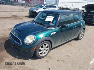 2009 MINI Hardtop S with VIN WMWMF73599TW83678, listed as a IAAI auction lot 42750705 with 95,278 mi miles and . Bid and sale history available at DreamBid. Image 2.