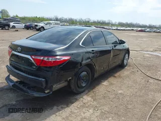 2016 Toyota Camry XLE with VIN 4T4BF1FK0GR581297, listed as a IAAI auction lot 42059507 with 151,777 mi miles. Bid and sale history available at carsss.com. Image 4.