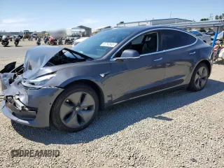 2019 Tesla Model 3 Mid Range with VIN 5YJ3E1EA2KF416304, listed as a Copart auction lot 52792845 with 140,552 mi miles and Salvage Title. Bid and sale history available at DreamBid. Image 1.