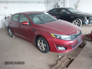 2015 Kia Optima LX z VIN 5XXGM4A70FG478058, wystawiony jako IAAI lot #42601113 z przebiegiem 160 964 mil mil oraz . Historia ofert i sprzedaży dostępna na DreamBid. Obrazek 1.
