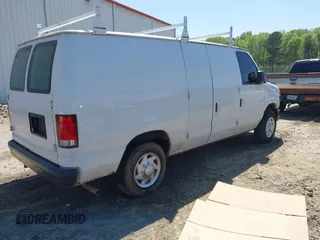 2014 Ford Econoline Cargo Commercial with VIN 1FTNE1EW2EDA99687, listed as a IAAI auction lot 41994371 with 204,466 mi miles and . Bid and sale history available at DreamBid. Image 4.