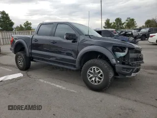 2021 Ford F-150 Raptor with VIN 1FTFW1RG3MFC62242, listed as a Copart auction lot 69325264 with 33,497 mi miles and Salvage Title. Bid and sale history available at carsss.com. Image 4.