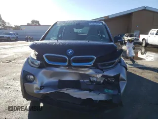 2015 BMW i3 with VIN WBY1Z4C56FV500991, listed as a Copart auction lot 43162913 with 57,885 mi miles. Bid and sale history available at carsss.com. Image 5.