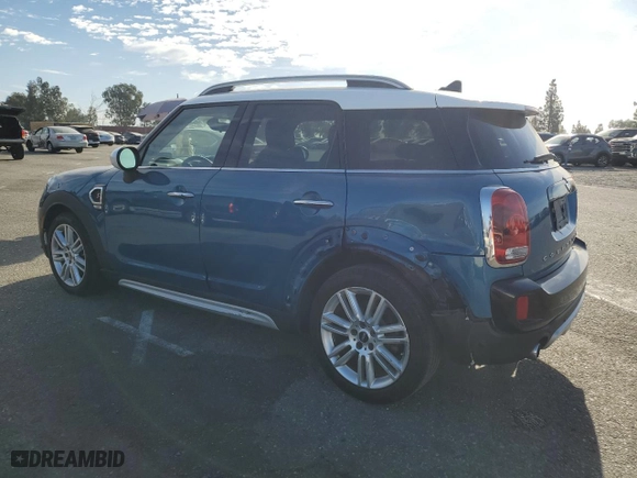 2017 MINI Countryman Cooper S with VIN WMZYT3C37H3B66319, listed as a Copart auction lot 77805204 with 65,452 mi miles and Salvage Title. Bid and sale history available at carsss.com. Image 2.