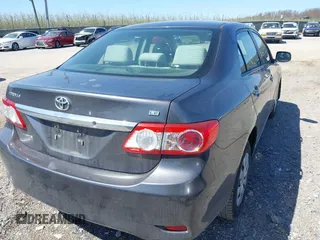 2011 Toyota Corolla L with VIN JTDBU4EE4B9144190, listed as a IAAI auction lot 42060728 with 115,299 mi miles. Bid and sale history available at carsss.com. Image 4.