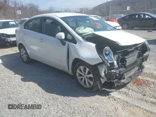 2013 Kia Rio SX with VIN KNADN4A34D6114344, listed as a IAAI auction lot 41797503 with 46,941 mi miles. Bid and sale history available at carsss.com. Image 1.