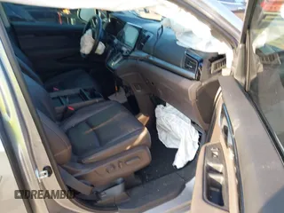 2023 Honda Odyssey Touring with VIN 5FNRL6H86PB020700, listed as a IAAI auction lot 41961098 with 66,512 mi miles and . Bid and sale history available at DreamBid. Image 5.