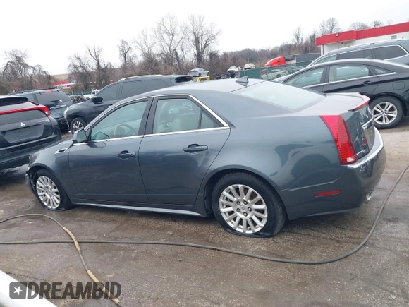 2011 Cadillac CTS Sedan Luxury with VIN 1G6DG5EY7B0163601, listed as a IAAI auction lot 41536256 with 106,523 mi miles. Bid and sale history available at carsss.com. Image 14.