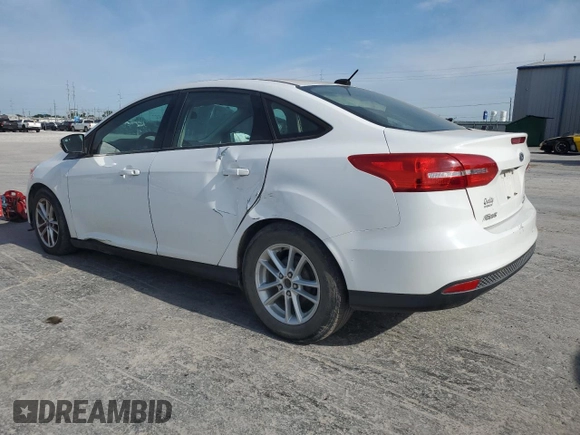 2015 Ford Focus SE with VIN 1FADP3F2XFL220072, listed as a Copart auction lot 58058255 with 128,871 mi miles and Clean title. Bid and sale history available at DreamBid. Image 2.