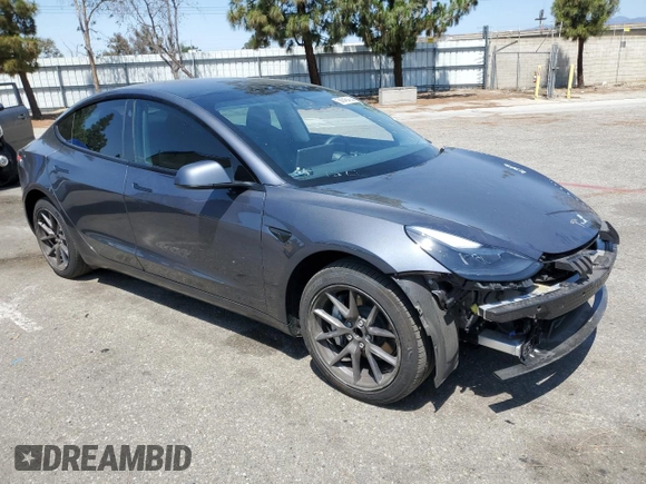 2023 Tesla Model 3 with VIN 5YJ3E1EA4PF615975, listed as a Copart auction lot 58845405 with 38,927 mi miles and Salvage title. Bid and sale history available at DreamBid. Image 4.