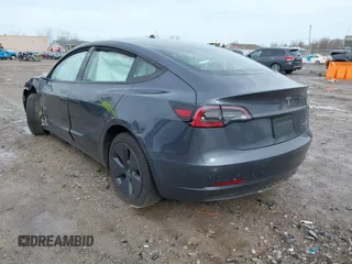2022 Tesla Model 3 Long Range with VIN 5YJ3E1EB8NF201023, listed as a IAAI auction lot 41942943 with 30,635 mi miles and . Bid and sale history available at DreamBid. Image 3.
