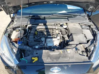 2018 Ford Focus SE with VIN 1FADP3FEXJL286396, listed as a IAAI auction lot 42634912 with 73,769 mi miles and . Bid and sale history available at DreamBid. Image 10.