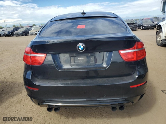 2011 BMW X6 M with VIN 5YMGZ0C54BLK13876, listed as a Copart auction lot 68567774 with 0 mi miles and Salvage Title. Bid and sale history available at carsss.com. Image 6.