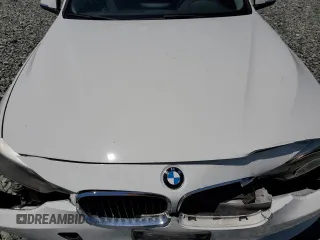 2014 BMW 3 Series 320i with VIN WBA3B1C55EK133687, listed as a Copart auction lot 63049945 with 95,604 mi miles and Salvage title. Bid and sale history available at DreamBid. Image 11.