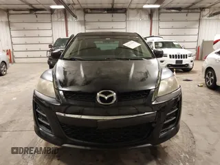 2010 Mazda CX-7 Sport z VIN JM3ER2W55A0340585, wystawiony jako IAAI lot #42167429 z przebiegiem 145 517 mil mil oraz . Historia ofert i sprzedaży dostępna na DreamBid. Obrazek 12.