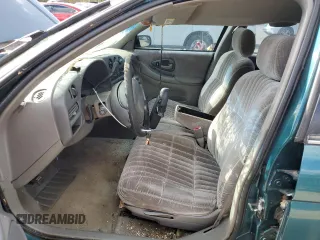 1998 Chevrolet Lumina LS with VIN 2G1WL52M2W1137056, listed as a Copart auction lot 74222044 with 179,699 mi miles and Salvage Title. Bid and sale history available at DreamBid. Image 7.
