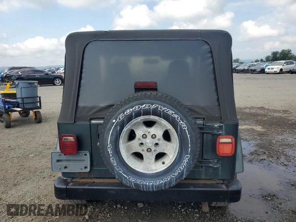 2003 Jeep Wrangler Sahara with VIN 1J4FA59S73P308250, listed as a Copart auction lot 64305965 with 186,288 mi miles and Clean title. Bid and sale history available at DreamBid. Image 6.