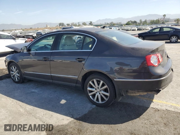 2010 Volkswagen Passat Komfort with VIN WVWJK7ANXAE129739, listed as a Copart auction lot 57798275 with 155,830 mi miles and Salvage title. Bid and sale history available at DreamBid. Image 2.