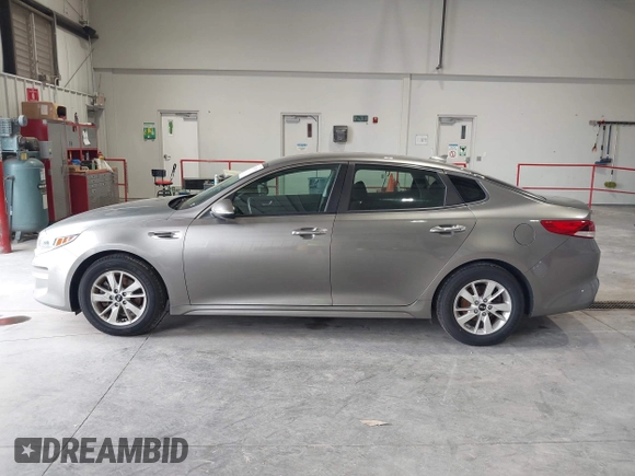 2016 Kia Optima LX with VIN 5XXGT4L33GG026183, listed as a IAAI auction lot 42156799 with 163,000 mi miles and . Bid and sale history available at carsss.com. Image 14.