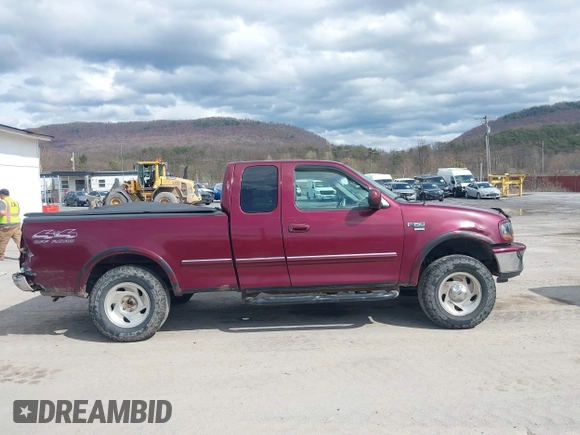 1998 Ford F-150 with VIN 1FTZX18W5WNC39962, listed as a IAAI auction lot 41951328 with 228,438 mi miles and . Bid and sale history available at DreamBid. Image 13.