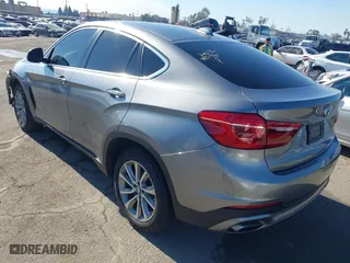 2015 BMW X6 xDrive50i with VIN 5UXKU6C52F0F94060, listed as a IAAI auction lot 41299202 with 67,835 mi miles. Bid and sale history available at carsss.com. Image 3.